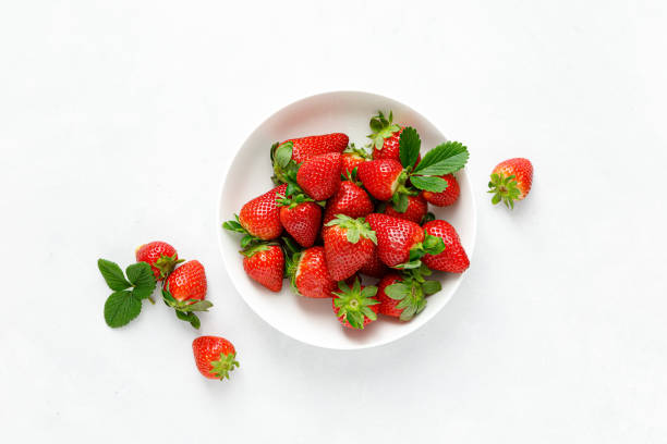 Strawberry on white background, top view, flat lay