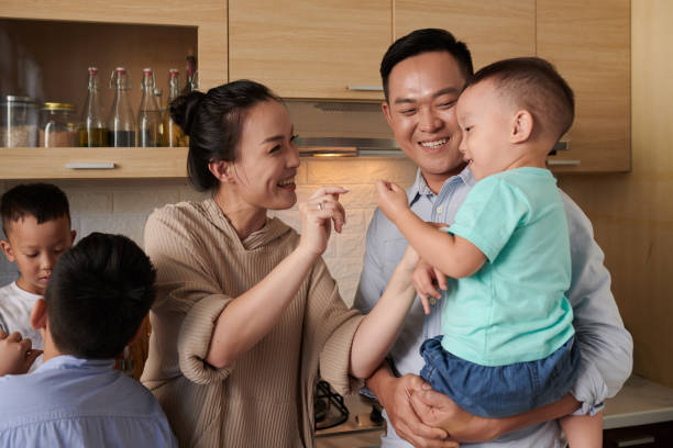 istock Vietnamese Family With Three Children 1390612353