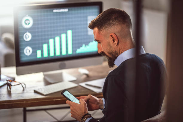 istock young businessman experiencing stress during at work 1390616586