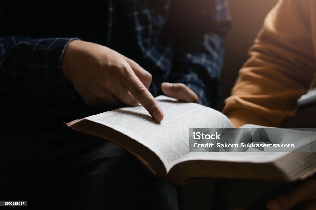 two lovers studying the bible It is God's love for Christians. Bible Stock Photo