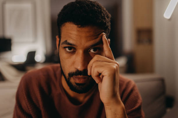 istock Portrait od sad young African - American man. 1390622021