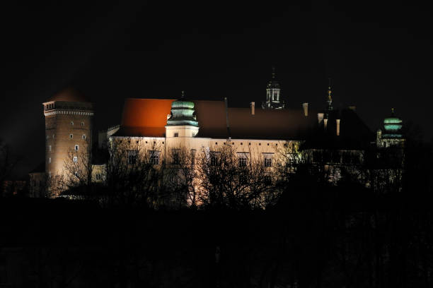 Night view of Wawel royal castle from window of house in Dietla street in Krakow