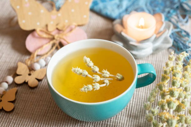 istock Tea in a turquoise cup with decoration - Greek mountain tea, herbal tea, white tea 1390629999