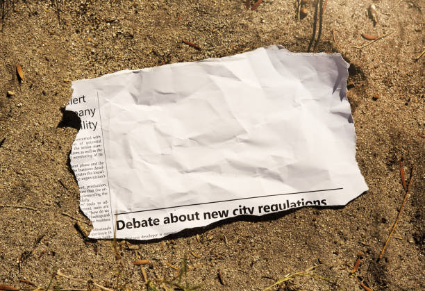 istock Crumpled cutting from a newspaper, with plenty of space for your copy 1390635973