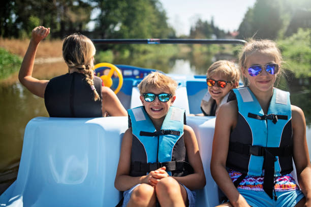 Family enjoying riding a pedalo on a river Family enjoying summer vacations vacations. Mother and kids riding a pedalo on river.
Nikon D850 paddleboat stock pictures, royalty-free photos & images