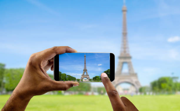 istock taking a photo in Paris with the cellphone 1390645992