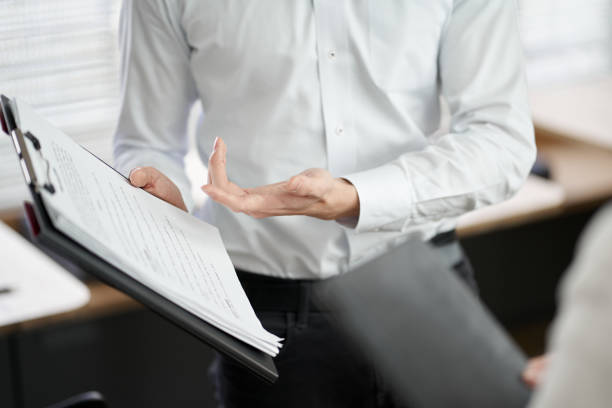 istock Asian business person explaining work procedure 1390646236