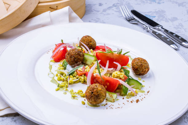 istock falafel balls in the dish with vegetables 1390650815
