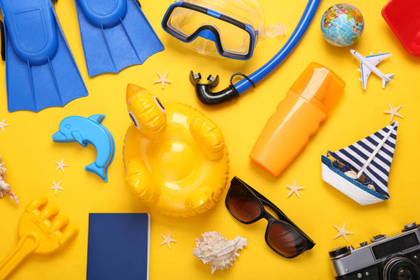 istock Composition with beach, travel objects on yellow background. Top view. Flat lay. Sea vocation 1390653535
