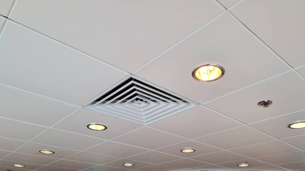 istock Air conditioner vent close up in ceiling 1390655327