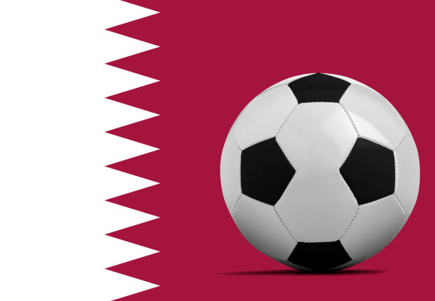 istock Soccer ball with Qatar national team flag. 1390657347