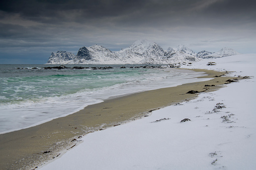 a Beach in Myrland in winter time with snow - Lofoten Islands - Norway