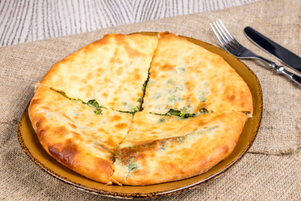 istock khachapuri with spinach and cheese on the board, georgian cuisine 1390661292