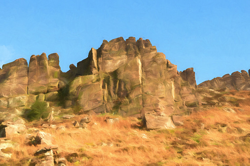 Digital watercolour of an autumnal Hen Cloud against a beautiful blue sky at the Roaches in the Peak District National park.