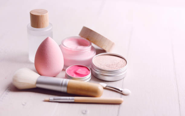 Pastel Pink Make-Up Natural cosmetics set, organic zero waste products with brush and beauty blender. cosmetics stock pictures, royalty-free photos & images