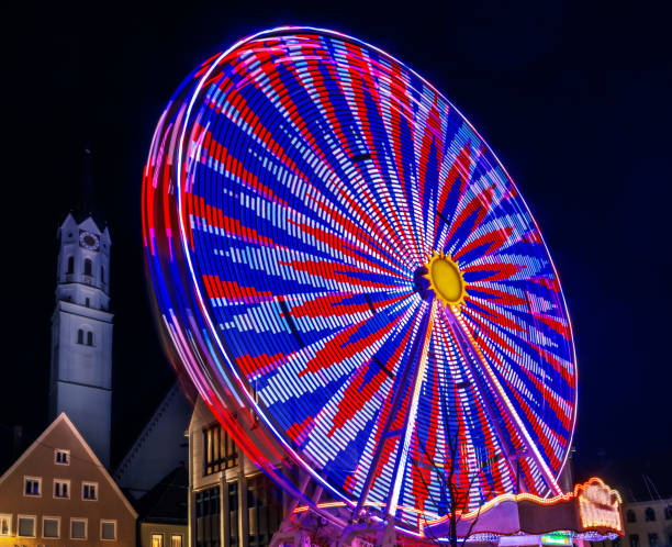 istock Historic ferris wheel in Schrobenhausen at night 1390666151