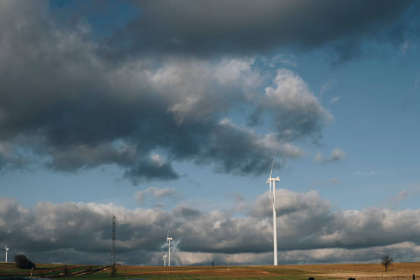 istock wind turbines on the field 1390670014