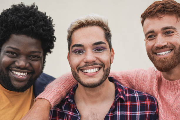 istock Happy multiracial men smiling on camera - Young people and diversity concept 1390670042