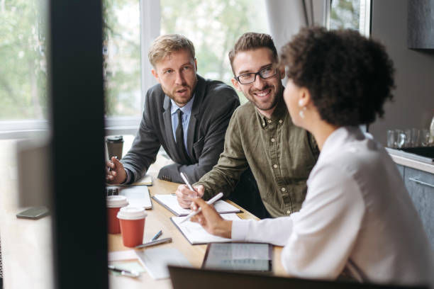 istock business team is discussing the documents for a new project 1390672773
