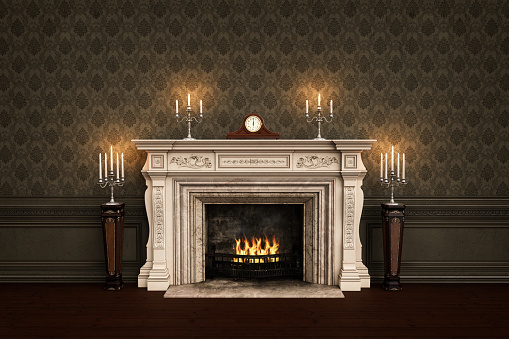 Vintage Victorian fireplace with carriage clock and candles on the mantlepiece and fire buring in the grate. 3D rendering.