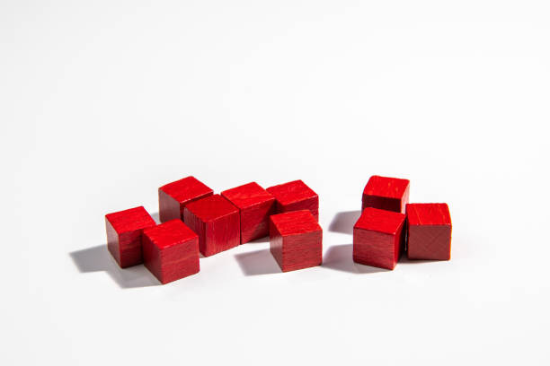 istock Red Wooden Game Cubes on White Background 1390678762