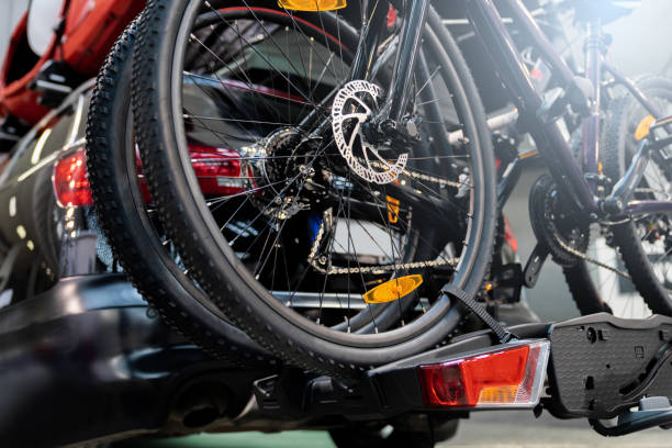 Car with bike rack Car with bikes on the hitch-mounting bike rack bicycle rack photos stock pictures, royalty-free photos & images