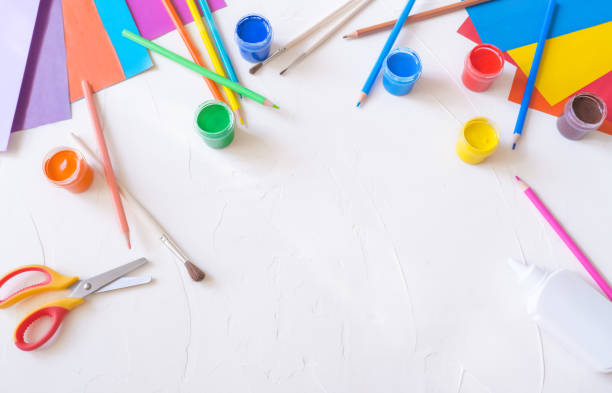 istock School supplies, stationery on white background - space for caption, top view 1390680911