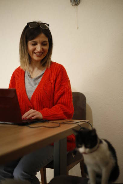 istock Young woman works from home 1390683334