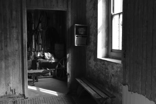 Beautiful vintage wooden house exterior in black and white