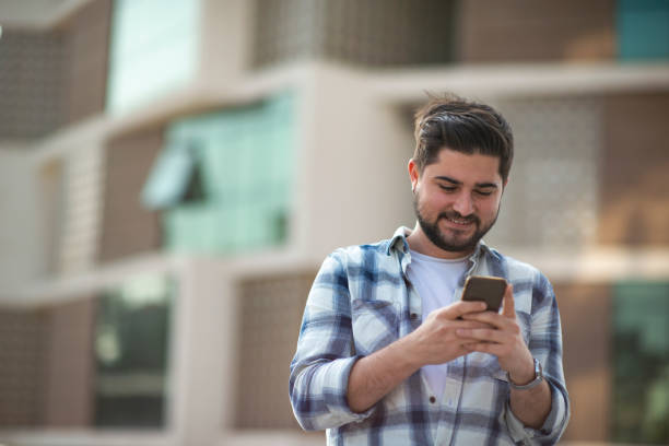 istock Happy young man learning good news on smartphone 1390684047