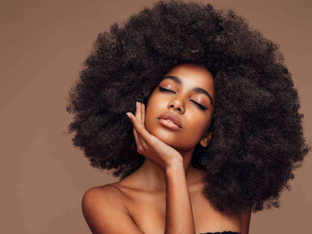 istock Beautiful girl with curly hairstyle 1390685559