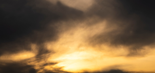 Beautiful bright dramatic sunset in the clouds.