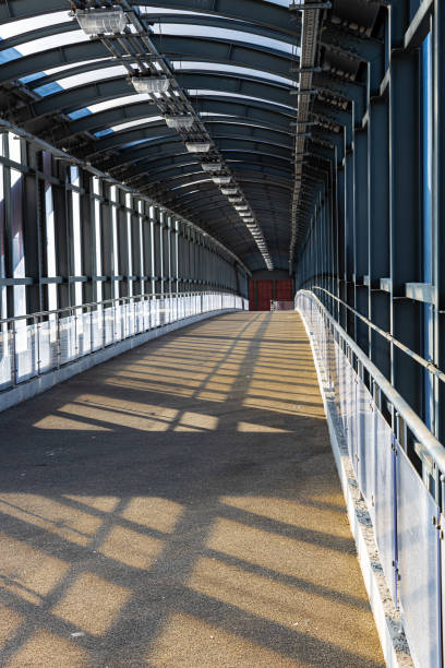 istock empty glazed overpass tunnel across the road 1390686515