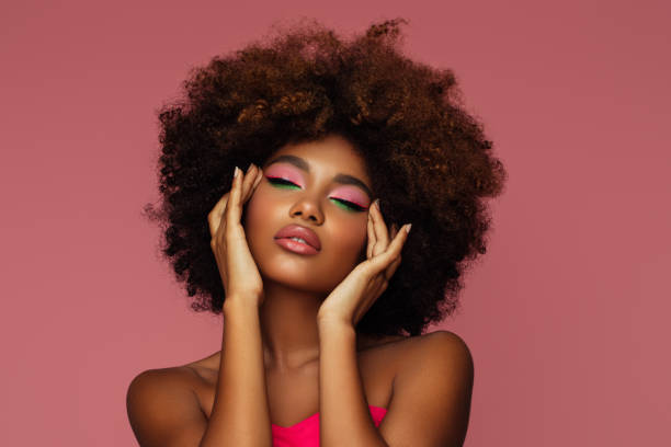 istock Beautiful afro woman with bright make-up 1390686694