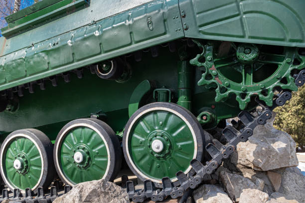 istock Novomoskovsk, Russia - March 24, 2022: tank caterpillar runs over a stone 1390686999