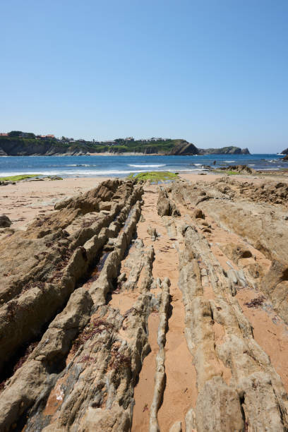 istock Rock formations in front of cliffs in northern Spain 1390688351