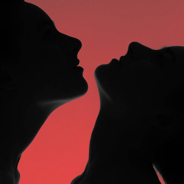 istock Womans face dark profile silhouette in pink background 1390692201