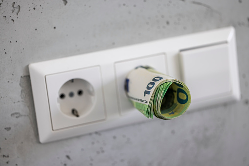 walls socket concept with hundreds of euro. power pricing rising high.