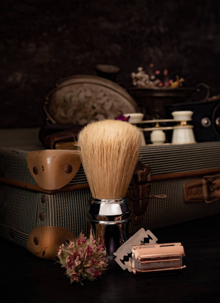 istock antique objects from the 50s, with shaving brush, razor and binoculars 1390693274