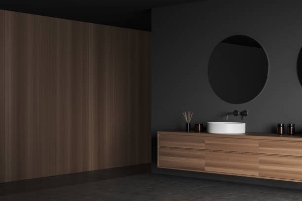 istock Wooden bathroom interior with sink and dresser, empty wall 1390696851