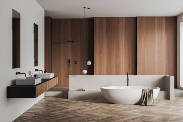 istock Front view on bright bathroom interior with bathtub, shower 1390697244