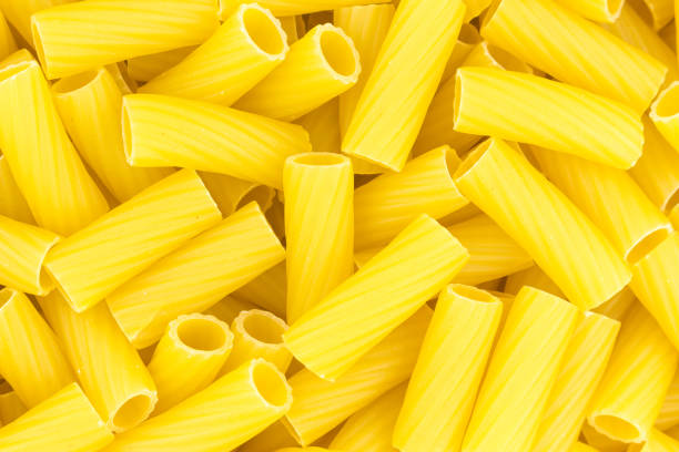 istock Uncooked short pasta tubes, elicoidali. Top view. 1390698406