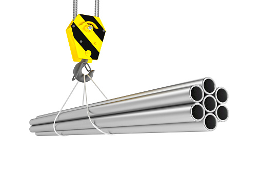 Rolled metal products suspended on a crane. 3d render