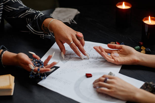 istock Fortune Teller Reading Stars for Young Woman 1390702838