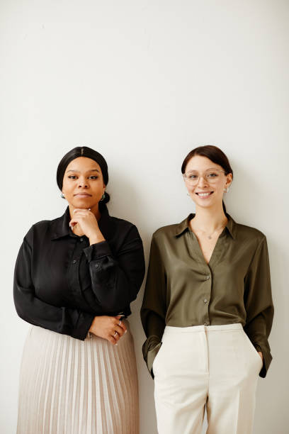 istock Smiling Female Entrepreneurs Minimal 1390702897