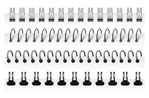 istock Notebook spirals, wire steel ring bindings and springs for diary. Spiral binder or ringed for paper calendar. Can use as page or notepad divider 1390706585