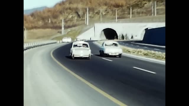road with car passage in the 1960s
