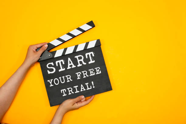 istock movie clapper with Start your free trial! 1390709436