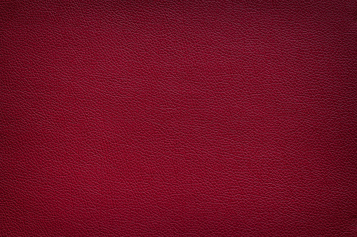 The texture of the mahogany red leather.