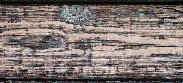 Wood texture of an old board with a knot.